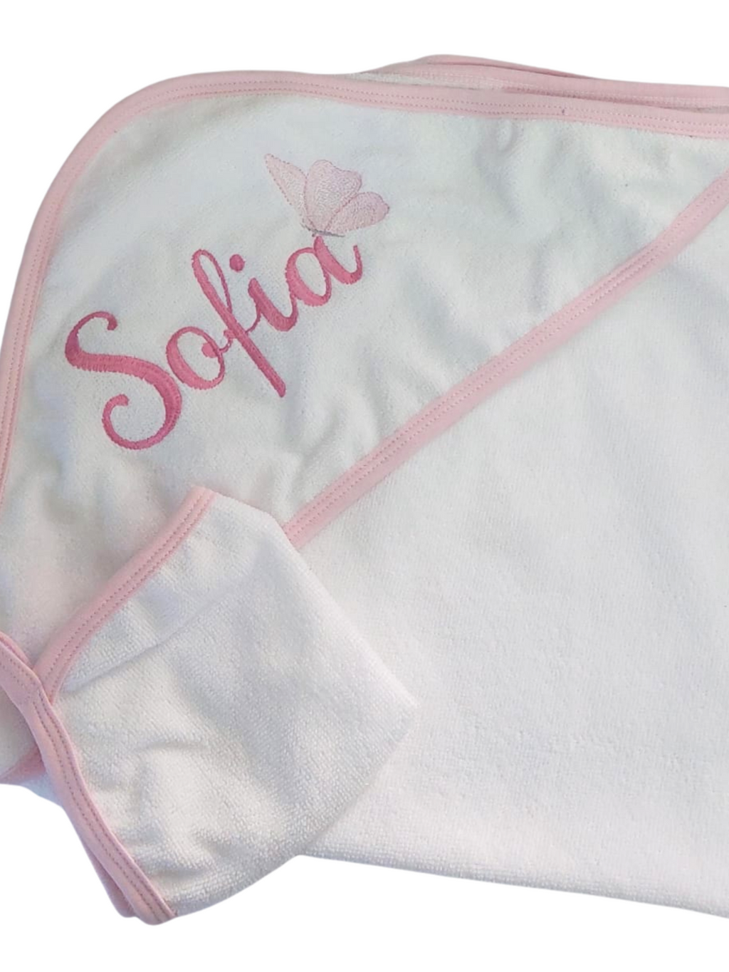 White hooded towel with pink trim and embroidered name 'Sofia' on a white background