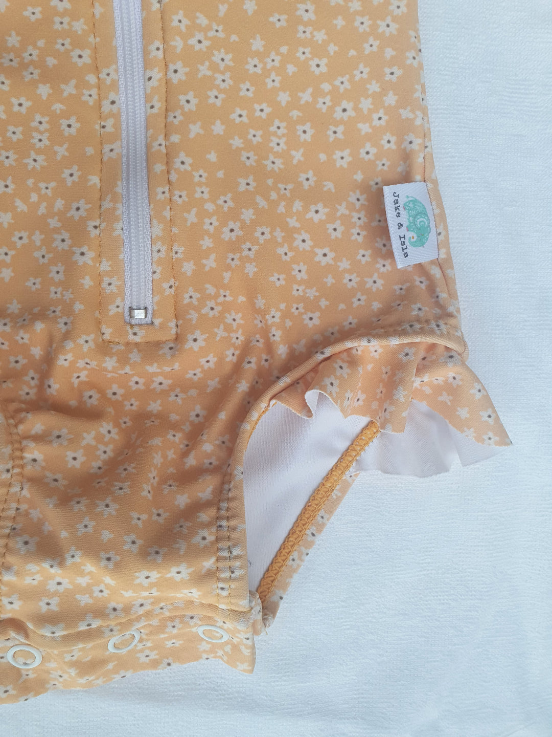 Hello Summer baby swimming costume with poppers from The Jake and Isla Collection