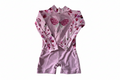 Pink children's swimsuit with butterfly design and 'Lizzy' branding on a white background