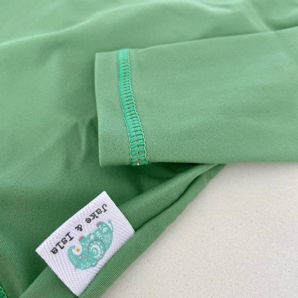 Olive baby rash vest from the Jake and Isla Collection