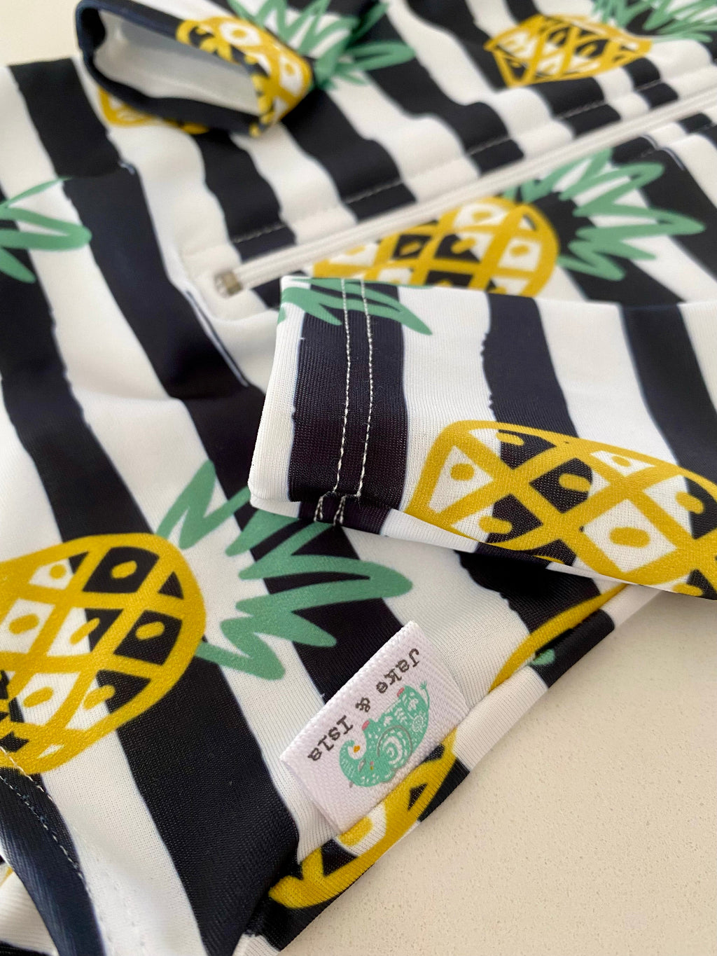 Pine apple girls long sleeved swimming costume from the Jake and Isla Collection Cape Town