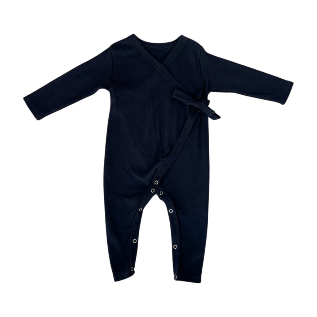 Black baby romper with wrap design on a white background
