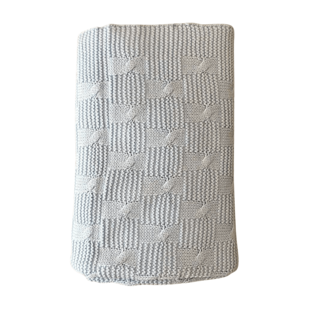 Textured blue blanket on a white background
