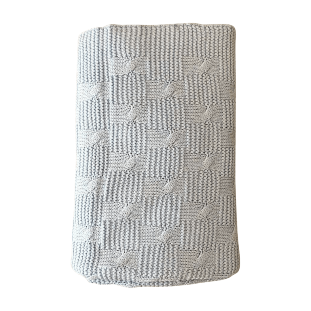 Textured blue blanket on a white background