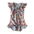 Floral-patterned baby swimsuit with ruffled sleeves on a white background
