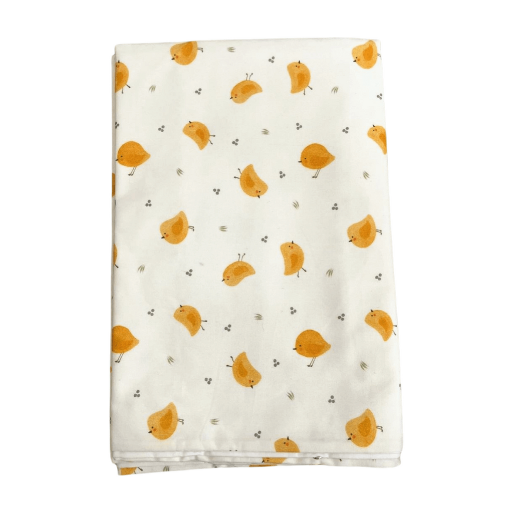 Flannel fabric with orange bird pattern on a white background