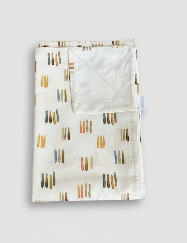 Folded fabric with abstract pattern on a white background