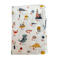 Children's blanket with alphabet and sea-themed illustrations on a white background
