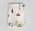 Fabric with car and tree patterns on a white background