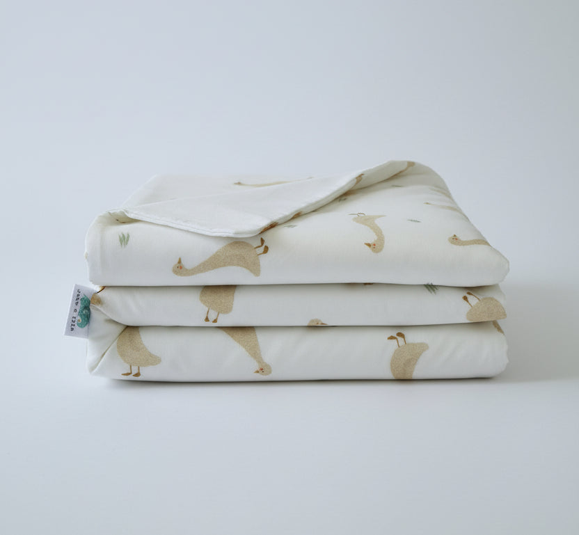 Fabric with duck pattern on a white background