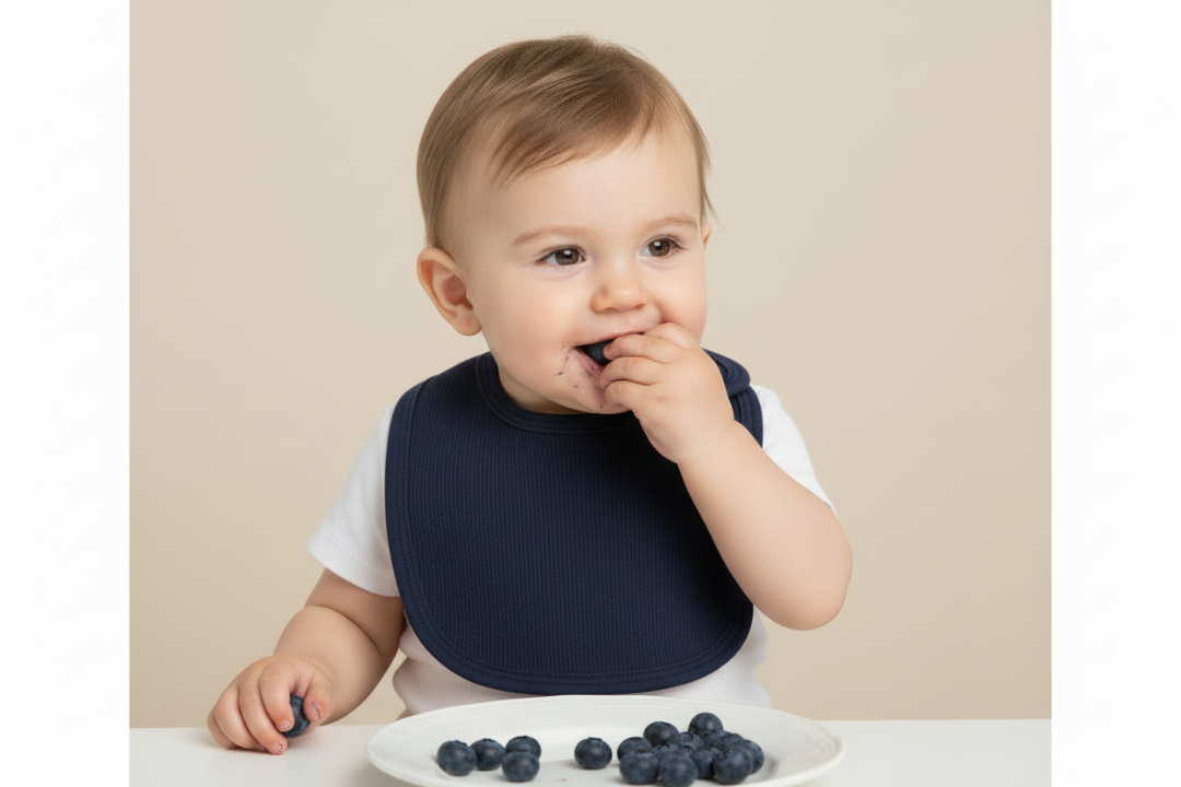 Blue baby bib on a white background