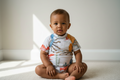 Children's rashvest with octopus and fish design on a white background