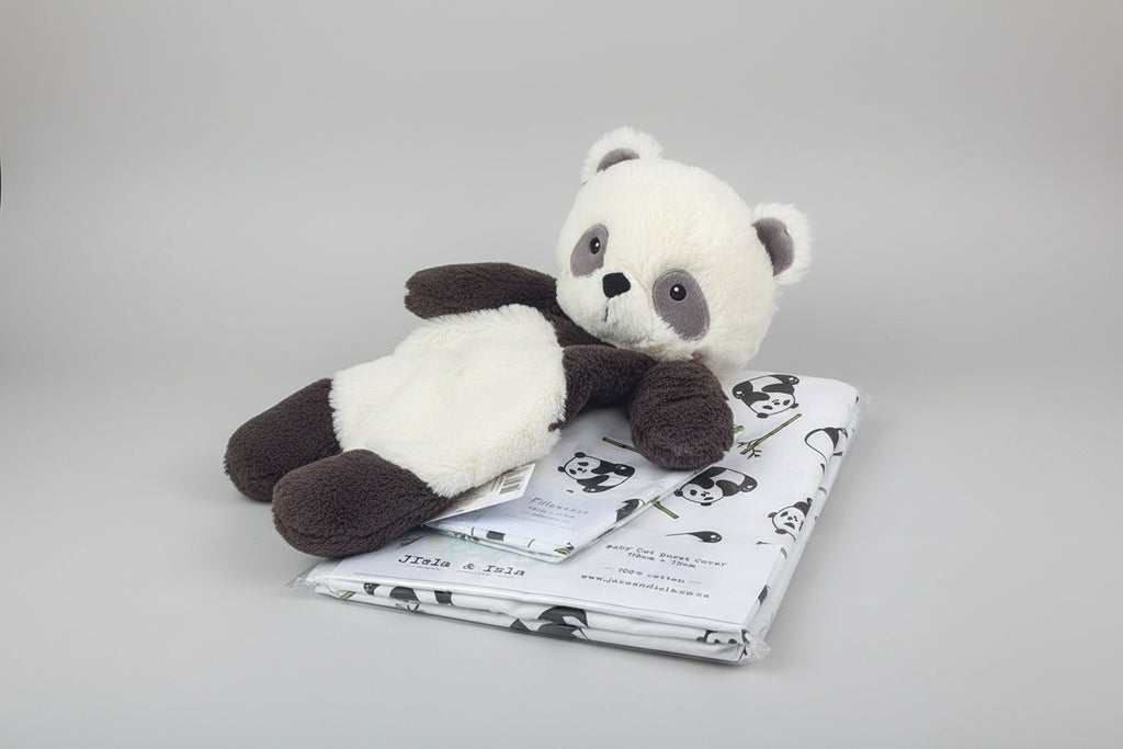 Plush panda toy on a package with panda design