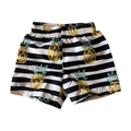 Black and white striped swim shorts with pineapple patterns on a white background