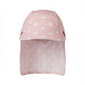 the front view of a swim hat with a pink polka dot design 