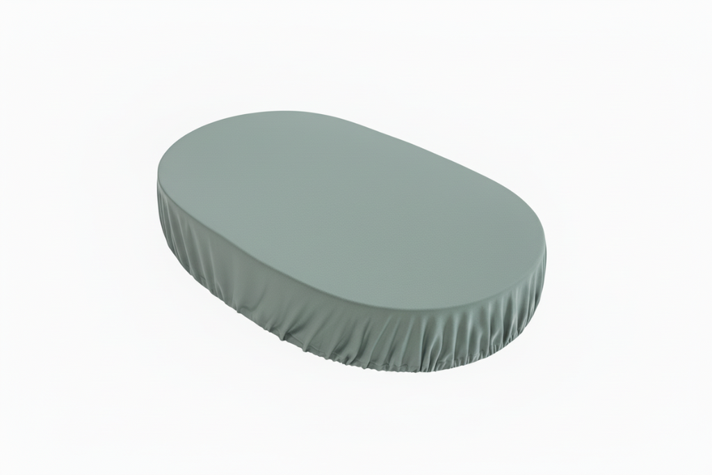 sage fitted sheet fitted onto a mattress