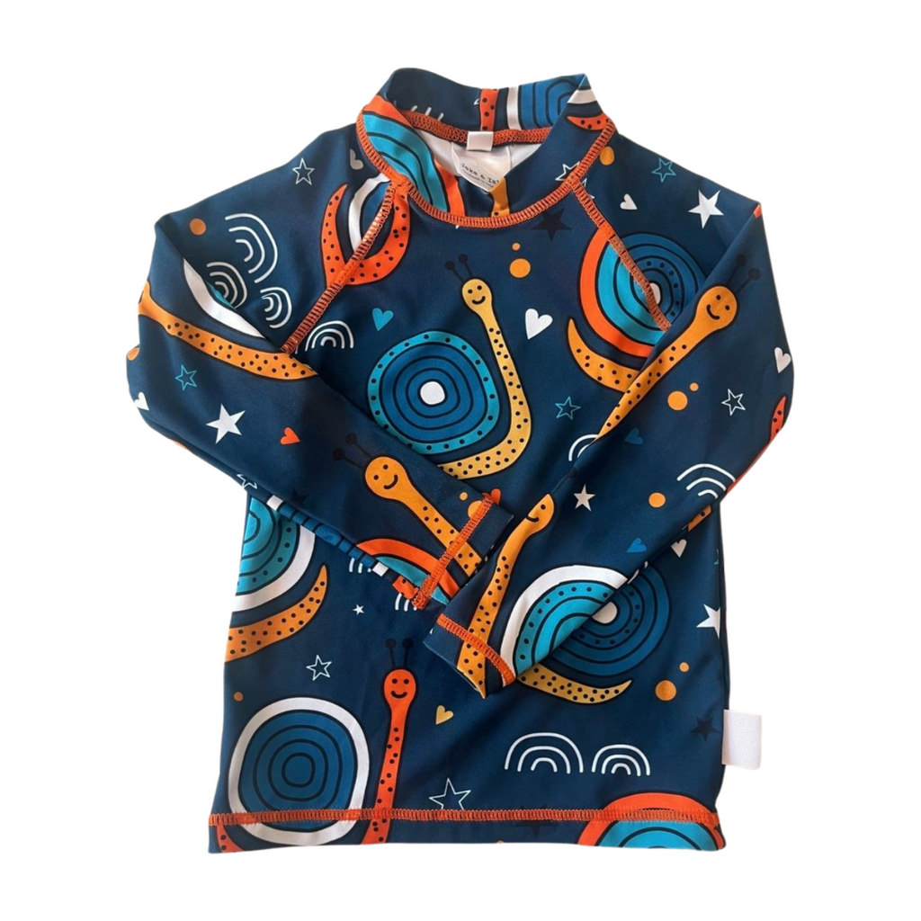 Children's shirt with space-themed design on a white background
