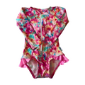 Colorful tie-dye swimsuit with ruffles on a white background