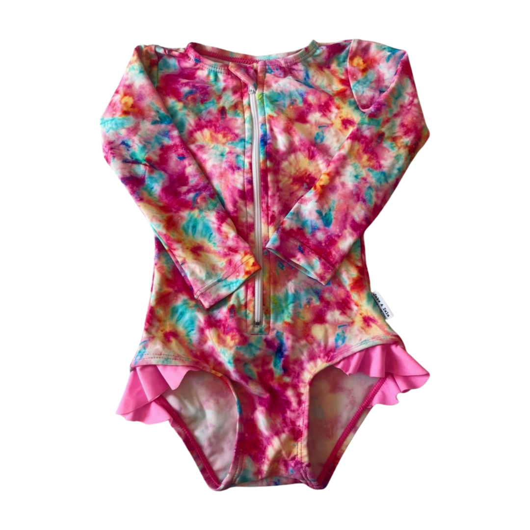Colorful tie-dye swimsuit with ruffles on a white background