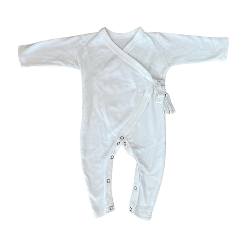 White baby wrap with buttons on a white background