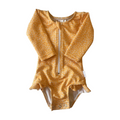 Yellow baby swimsuit with floral pattern on a white background - the Jake and sla collection