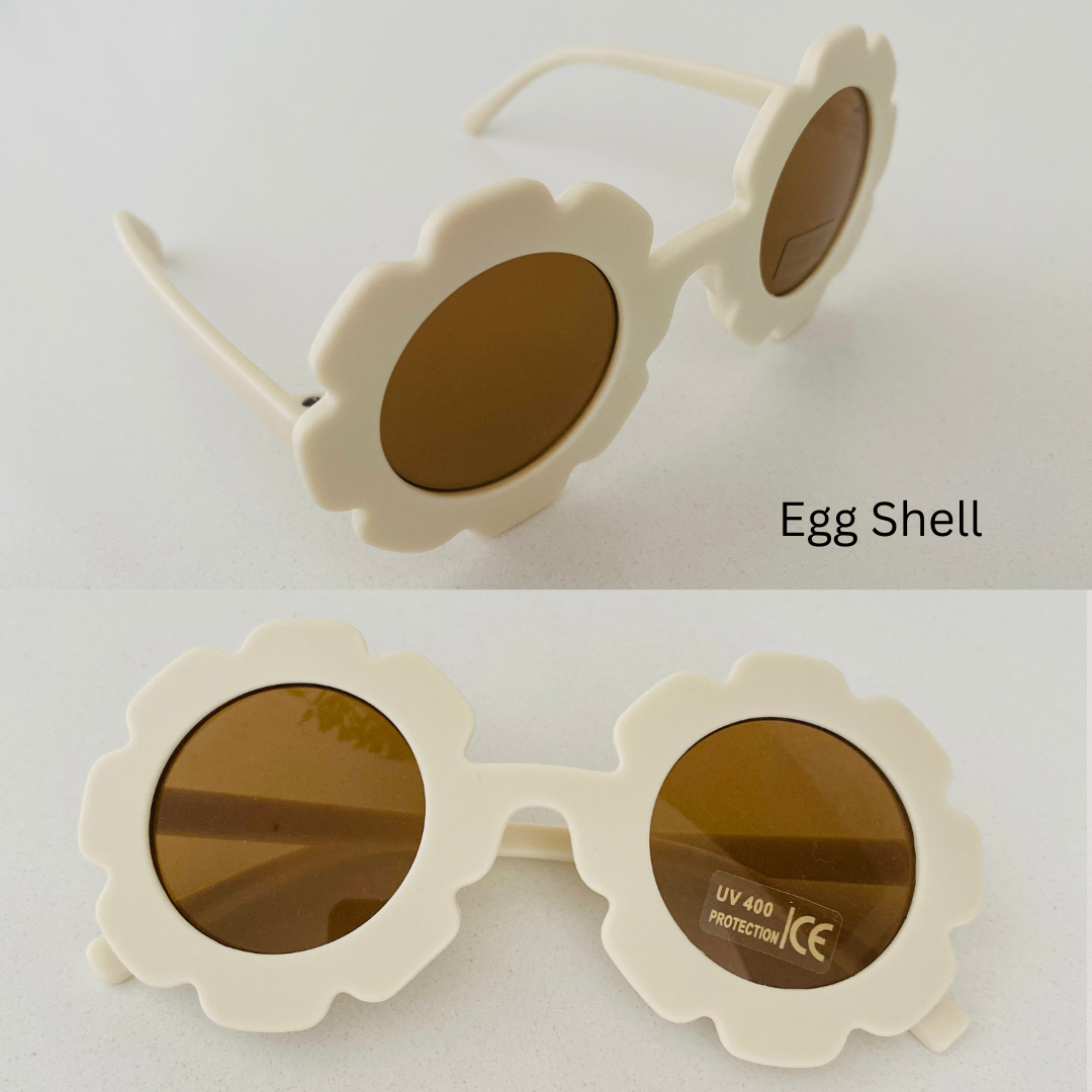 eggshell flower sunglasses on white bacground