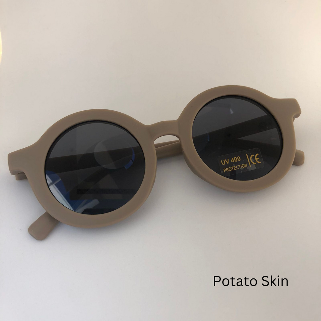 potato skin sunglasses on white background